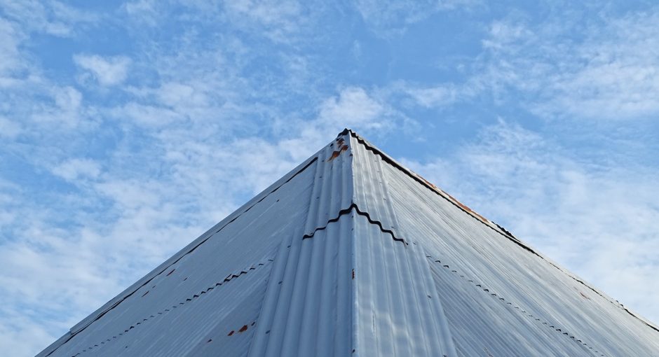 corrugated roof on the sky background