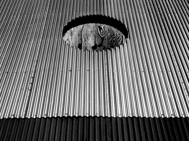 corrugated roof with a hole