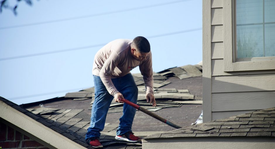 person standing on the roof